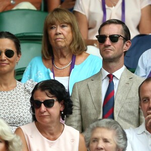 Pippa Middleton, enceinte, et son mari James Matthews au tournoi de Wimbledon à Londres, le 13 juillet 2018.