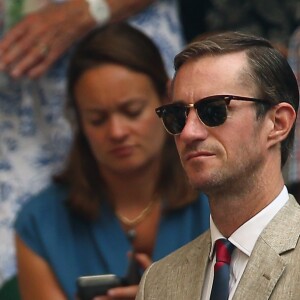 Pippa Middleton, enceinte, et son mari James Matthews au tournoi de Wimbledon à Londres, le 13 juillet 2018.