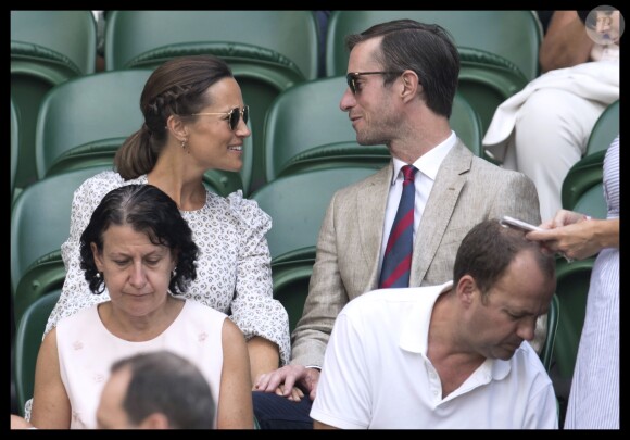 Pippa Middleton, enceinte, et son mari James Matthews au tournoi de Wimbledon à Londres, le 13 juillet 2018.