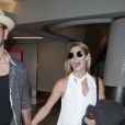 Exclusif - Les jeunes mariés, Ashley Greene et son mari Paul Khoury, arrivent à l'aéroport de LAX à Los Angeles après avoir passé leur lune de miel à Hawaii, le 14 juillet 2018