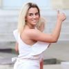 Erika Choperena, la femme d'Antoine Griezmann, avec leur fille Mia - Le président de la République Française Emmanuel Macron et la première dame Brigitte Macron accueillent les joueurs de l'équipe de France et leur sélectionneur Didier Deschamps, le président de la Fédération Française de Football Noël Le Graët et des membres de la FFF, au Palais de l'Elysée. L'équipe de France est en provenance directe de Russie où elle a été sacrée Championne du Monde 2018, pour la deuxième fois de son histoire, après sa victoire en finale face à la Croatie (4-2). Paris, le 16 juillet 2018. © Stéphane Lemouton/Bestimage
