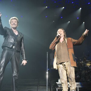 Exclusif - Johnny Hallyday, avec Florent Pagny, en concert au Palais Omnisports de Paris Bercy pour son 70e anniversaire dans le cadre du "Born Rocker Tour", le 15 juin 2013.