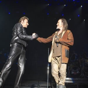 Exclusif - Johnny Hallyday, avec Florent Pagny, en concert au Palais Omnisports de Paris Bercy pour son 70e anniversaire dans le cadre du "Born Rocker Tour", le 15 juin 2013.