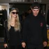 Paris Hilton et son fiancé Chris Zylka arrivent à l' aéroport à Los Angeles Le 27 Juillet 2018