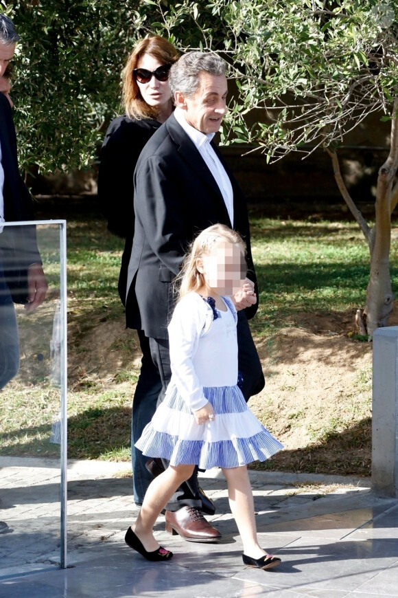Nicolas Sarkozy, sa femme Carla Bruni et leur fille Giulia arrivent au musée de l'Acropole à Athènes. Le 24 octobre 2017.