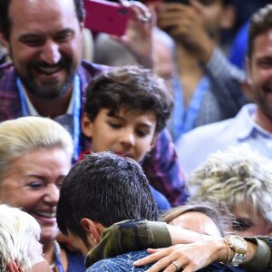 Novak Djokovic, vainqueur de l'US Open de Tennis 2018 à New York, avec ses proches, le 9 septembre 2018.