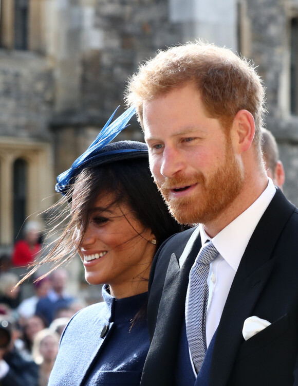 Le prince Harry, duc de Sussex, et Meghan Markle, duchesse de Sussex - Sorties après la cérémonie de mariage de la princesse Eugenie d'York et Jack Brooksbank en la chapelle Saint-George au château de Windsor, Royaume Uni, le 12 octobre 2018.