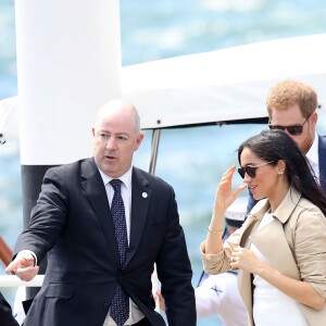 Le prince Harry et Meghan Markle arrivent sur le quai d'embarquement Man O'War Steps à Sydney, Australie, le 16 octobre 2018