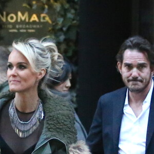 Exclusif - Laeticia Hallyday, son mari Johnny Hallyday, et leurs amis vont dîner au restaurant chic Boom Boom (qui se situe au dernier étage du Standard Hotel dans le quartier à la mode du Meatpacking District) à l'occasion de l'anniversaire de Laeticia qui fête ses 40 ans à New York, le 19 mars 2015. Ils sont également accompagnés du manager du rocker, Sébastien Farran. Les festivités dureront jusqu'au samedi 21 mars.