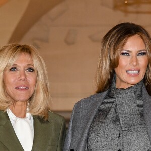 Brigitte Macron et Melania Trump lors du déjeuner des conjoints de chefs d'Etat et de gouvernement présents à la cérémonie internationale du centenaire de l'armistice de 1918 au château de Versailles le 11 novembre 2018. © Pierre Perusseau / Bestimage