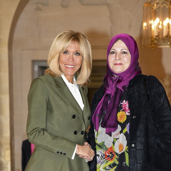 Brigitte Macron et Nadia Reffat (Femme du premier ministre lybien) lors du déjeuner des conjoints de chefs d'Etat et de gouvernement présents à la cérémonie internationale du centenaire de l'armistice de 1918 au château de Versailles le 11 novembre 2018. © Pierre Perusseau / Bestimage