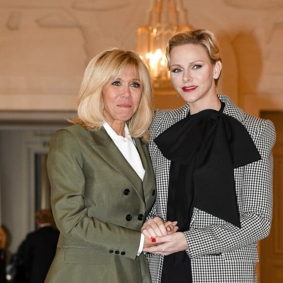 Brigitte Macron et la princesse Charlene de Monaco lors du déjeuner des conjoints de chefs d'Etat et de gouvernement présents à la cérémonie internationale du centenaire de l'armistice de 1918 au château de Versailles le 11 novembre 2018. © Pierre Perusseau / Bestimage