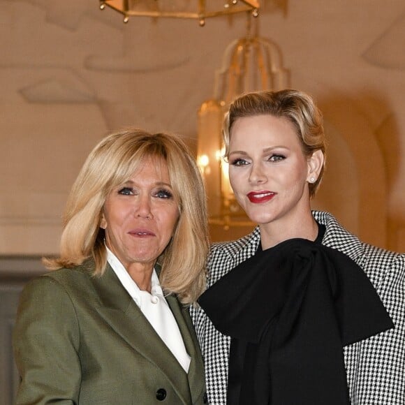 Brigitte Macron et la princesse Charlene de Monaco lors du déjeuner des conjoints de chefs d'Etat et de gouvernement présents à la cérémonie internationale du centenaire de l'armistice de 1918 au château de Versailles le 11 novembre 2018. © Pierre Perusseau / Bestimage