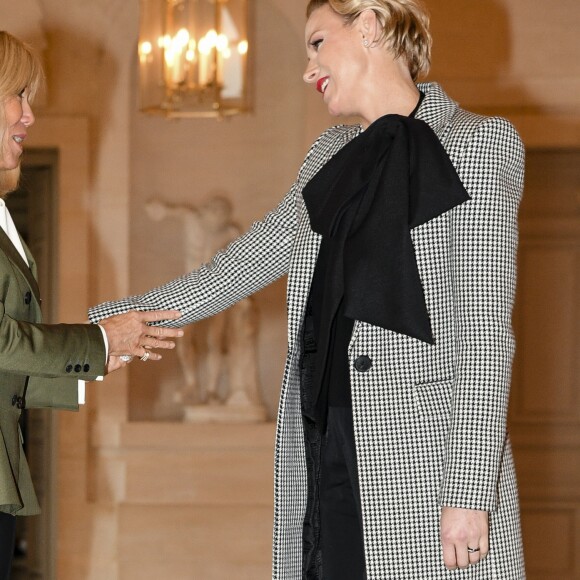 Brigitte Macron et la princesse Charlene de Monaco lors du déjeuner des conjoints de chefs d'Etat et de gouvernement présents à la cérémonie internationale du centenaire de l'armistice de 1918 au château de Versailles le 11 novembre 2018. © Pierre Perusseau / Bestimage
