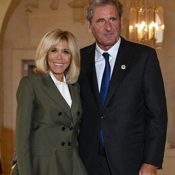 Brigitte Macron et Xavier Giocanti lors du déjeuner des conjoints de chefs d'Etat et de gouvernement présents à la cérémonie internationale du centenaire de l'armistice de 1918 au château de Versailles le 11 novembre 2018. © Pierre Perusseau / Bestimage