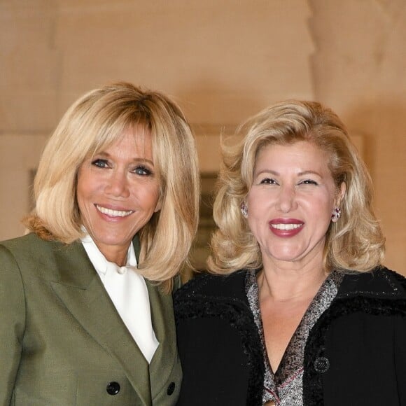 Brigitte Macron et Dominique Ouattara (Femme du président ivoirien) lors du déjeuner des conjoints de chefs d'Etat et de gouvernement présents à la cérémonie internationale du centenaire de l'armistice de 1918 au château de Versailles le 11 novembre 2018. © Pierre Perusseau / Bestimage