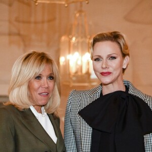 Brigitte Macron et la princesse Charlene de Monaco lors du déjeuner des conjoints de chefs d'Etat et de gouvernement présents à la cérémonie internationale du centenaire de l'armistice de 1918 au château de Versailles le 11 novembre 2018. © Pierre Perusseau / Bestimage illes