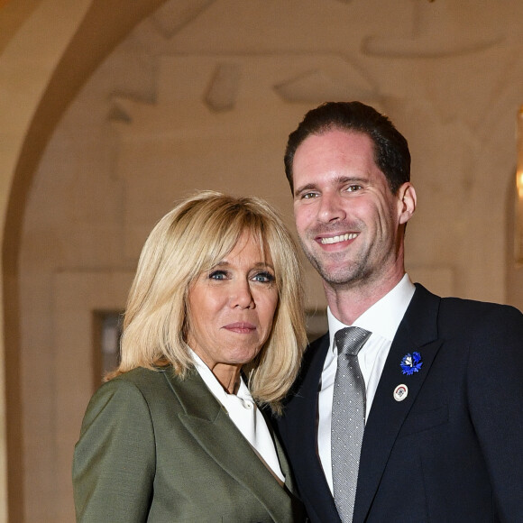 Brigitte Macron et Gauthier Destenay (Mari du premier ministre du Luxembourg) lors du déjeuner des conjoints de chefs d'Etat et de gouvernement présents à la cérémonie internationale du centenaire de l'armistice de 1918 au château de Versailles le 11 novembre 2018. © Pierre Perusseau / Bestimage