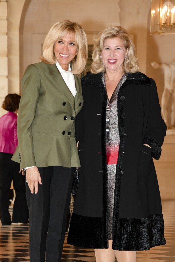 Brigitte Macron et Dominique Ouattara (Femme du président ivoirien) lors du déjeuner des conjoints de chefs d'Etat et de gouvernement présents à la cérémonie internationale du centenaire de l'armistice de 1918 au château de Versailles le 11 novembre 2018. © Pierre Perusseau / Bestimage