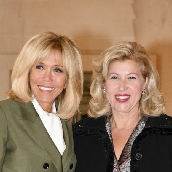 Brigitte Macron et Dominique Ouattara (Femme du président ivoirien) lors du déjeuner des conjoints de chefs d'Etat et de gouvernement présents à la cérémonie internationale du centenaire de l'armistice de 1918 au château de Versailles le 11 novembre 2018. © Pierre Perusseau / Bestimage