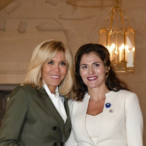 Brigitte Macron et Betty Batziana (Compagne du premier ministre grec) lors du déjeuner des conjoints de chefs d'Etat et de gouvernement présents à la cérémonie internationale du centenaire de l'armistice de 1918 au château de Versailles le 11 novembre 2018. © Pierre Perusseau / Bestimage