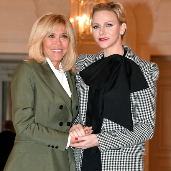 La première dame Brigitte Macron et la princesse Charlene de Monaco lors du déjeuner des conjoints de chefs d'Etat et de gouvernement présents à la cérémonie internationale du centenaire de l'armistice de 1918 au château de Versailles le 11 novembre 2018. © Pierre Perusseau / Bestimage