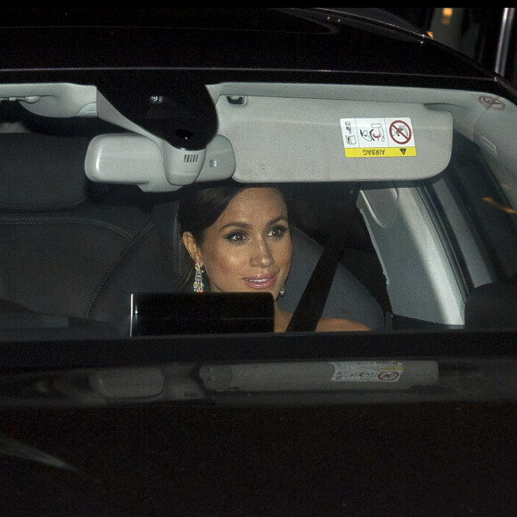 Le prince Harry et la duchesse Meghan de Sussex (Meghan Markle) arrivant à Buckingham Palace pour le dîner du 70e anniversaire du prince Charles, le 14 novembre 2018.