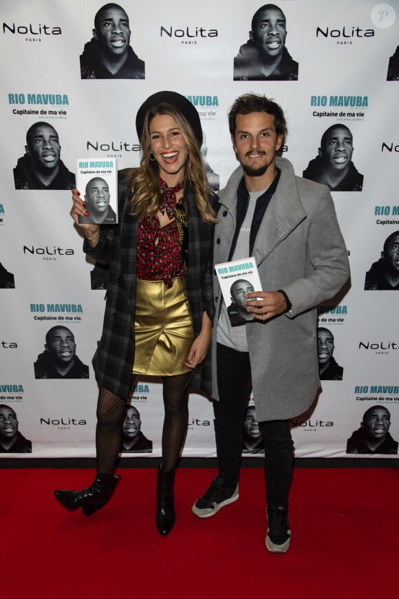 Exclusif - Laury Thilleman (Miss France 2011) et son compagnon le chef cuisinier Juan Arbelaez - Soirée de lancement du livre de Rio Mavuba "Capitaine de ma vie. L'exil, le foot, les Bleus" au restaurant NoLita Ristorante e Enoteca à Paris, France, le 14 novembre 2018. © Pierre Perusseau/Bestimage