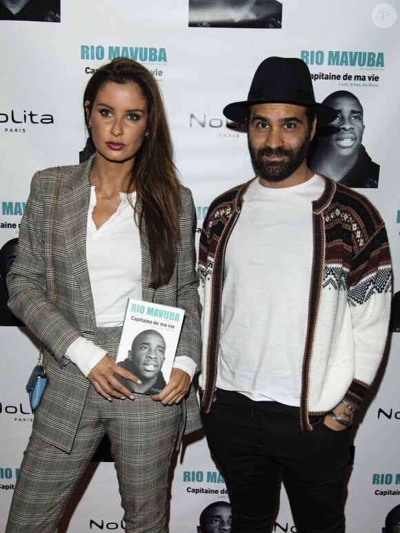 Exclusif - Malika Ménard (Miss France 2010) et son compagnon Ycare - Soirée de lancement du livre de Rio Mavuba "Capitaine de ma vie. L'exil, le foot, les Bleus" au restaurant NoLita Ristorante e Enoteca à Paris, France, le 14 novembre 2018. © Pierre Perusseau/Bestimage