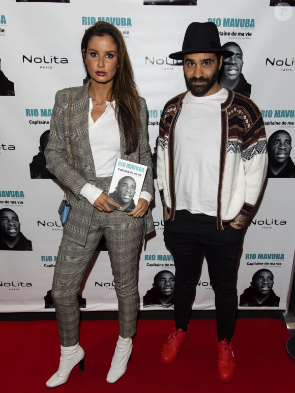 Exclusif - Malika Ménard (Miss France 2010) et son compagnon Ycare - Soirée de lancement du livre de Rio Mavuba "Capitaine de ma vie. L'exil, le foot, les Bleus" au restaurant NoLita Ristorante e Enoteca à Paris, France, le 14 novembre 2018. © Pierre Perusseau/Bestimage