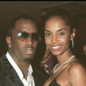 P. Diddy et Kim Porter lors d'une soirée à Paris en 2002