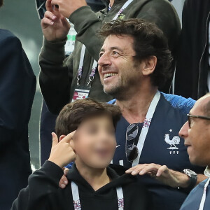 Patrick Bruel et son fils - Célébrités dans les tribunes lors de la demi-finale de la coupe du monde opposant la France à la Belgique à Saint-Pétersbourg le 10 juillet 2018 © Cyril Moreau/Bestimage