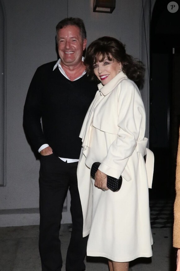 Photo Piers Morgan photographi avec Joan Collins au restaurant