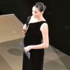 La duchesse de Sussex, Meghan Markle, enceinte à la soirée Fashion Awards 2018 en partenariat avec Swarovski au Royal Albert Hall à Londres, le 10 décembre 2018.