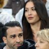 Adil Rami et Sidonie Biémont enceinte lors du match du quart de finale de l'UEFA Euro 2016 France-Islande au Stade de France à Saint-Denis, le 3 juillet 2016. © Cyril Moreau/Bestimage