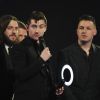 Alex Turner, Nick O'Malley, Jaime Cook et Matt Helders du groupe Arctic Monkeys (prix du groupe britannique et prix de l'album britannique de l'année : "AM", Arctic Monkeys) - Soirée des "Brit Awards 2014" en partenariat avec MasterCard à Londres, le 19 février 2014.
