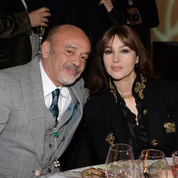 Christian Louboutin et Monica Bellucci à la 17ème édition du "Dîner de la mode du Sidaction" au Pavillon d'Armenonville à Paris, France, le 24 janvier 2019. Depuis 2003, ce dîner permet de montrer l'engagement indéfectible du monde de la mode en faveur de la lutte contre le sida. © Rachid Bellak/Bestimage