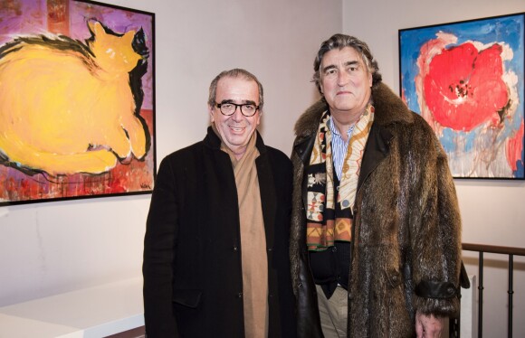 Felix Farrington et Didier Ludot lors du vernissage d'Amanda Lear à la Galerie du Passage à Paris, le 6 février 2019. © Julio Piatti/Bestimage