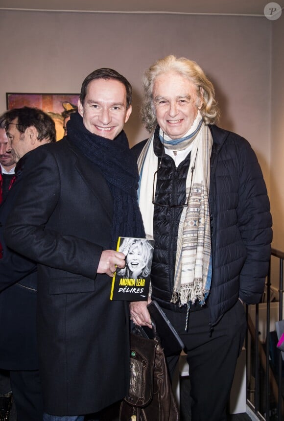 Xavier Brunet et Patrice Calmettes lors du vernissage d'Amanda Lear à la Galerie du Passage à Paris, le 6 février 2019. © Julio Piatti/Bestimage