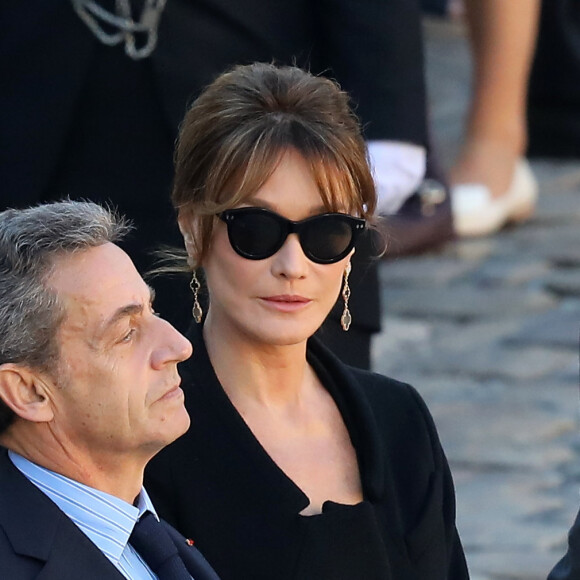 Nicolas Sarkozy, Carla Bruni Sarkozy - Arrivées à l'hommage national à Charles Aznavour à l'Hôtel des Invalides à Paris. Le 5 octobre 2018 © Jacovides-Moreau / Bestimage