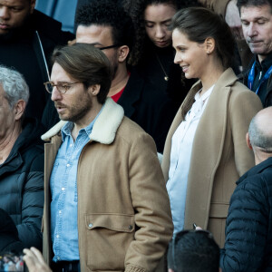 Ophélie Meunier et son mari Mathieu Vergne ont assisté au match de Ligue 1 entre le Paris Saint-Germain et Nîmes au Parc des Princes le 23 février 2019.