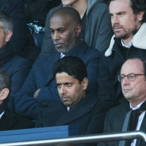 Nicolas Sarkozy, Nasser al Khelaïfi et François Hollande lors du match de Ligue 1 entre le Paris Saint-Germain et Nîmes au Parc des Princes le 23 février 2019.