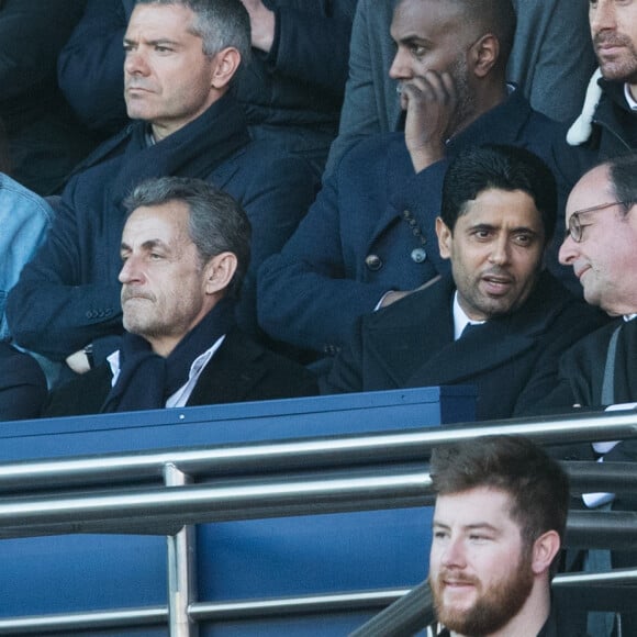 Nicolas Sarkozy, Nasser al Khelaïfi et François Hollande lors du match de Ligue 1 entre le Paris Saint-Germain et Nîmes au Parc des Princes le 23 février 2019.