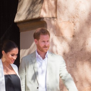 Le prince Harry et Meghan Markle, duchesse de Sussex, enceinte, aux Jardins andalous à Rabat lors de leur voyage officiel au Maroc, le 25 février 2019.