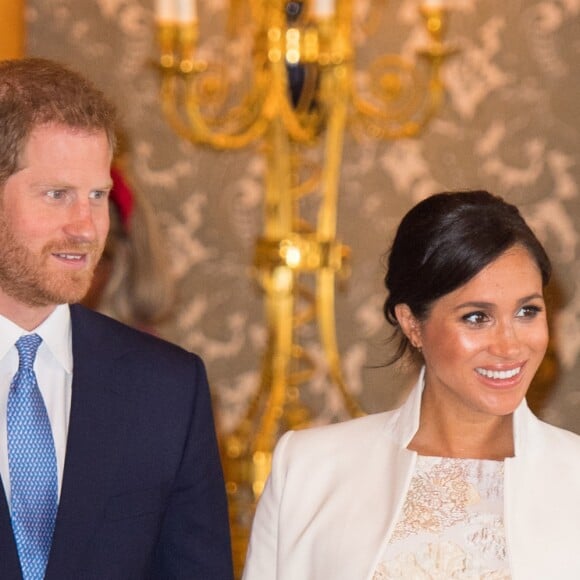 Le prince Harry, duc de Sussex, et Meghan Markle (enceinte), duchesse de Sussex - La famille royale d'Angleterre lors de la réception pour les 50 ans de l'investiture du prince de Galles au palais Buckingham à Londres. Le 5 mars 2019.