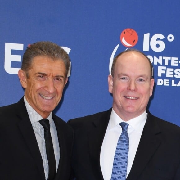 Le prince Albert II de Monaco avec Ezio Greggio au 16e Monte-Carlo Film Festival de la Comédie à Monaco le 9 mars 2019.