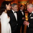 George Clooney et sa femme Amal Clooney avec le prince Charles - Dîner "The Princes Trust" au Buckingham Palace à Londres, le 12 mars 2019.
