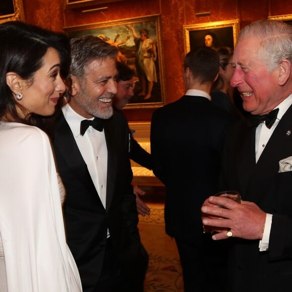 George Clooney et sa femme Amal Clooney avec le prince Charles - Dîner "The Princes Trust" au Buckingham Palace à Londres, le 12 mars 2019.