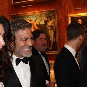 George Clooney et sa femme Amal Clooney avec le prince Charles - Dîner "The Princes Trust" au Buckingham Palace à Londres, le 12 mars 2019.