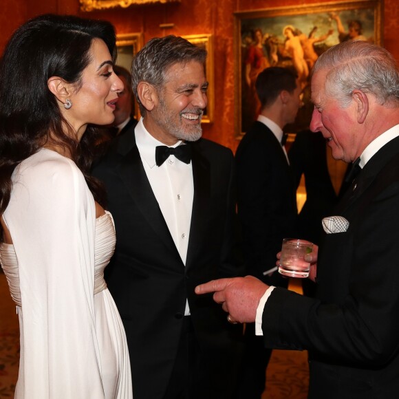 George Clooney et sa femme Amal Clooney avec le prince Charles - Dîner "The Princes Trust" au Buckingham Palace à Londres, le 12 mars 2019.
